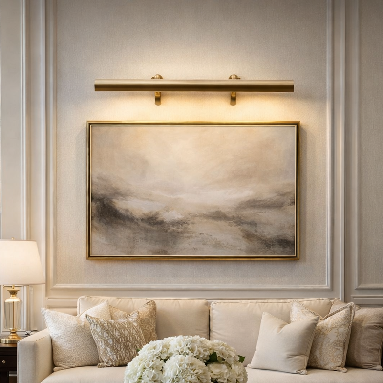 Luxurious living room with a beige sofa, coffee table, and wall art.